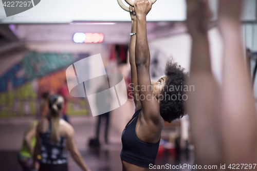 Image of black woman doing dipping exercise