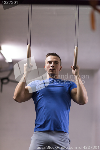 Image of man doing dipping exercise