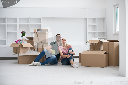 Image of young couple in new house