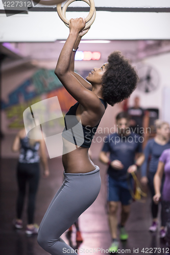 Image of black woman doing dipping exercise