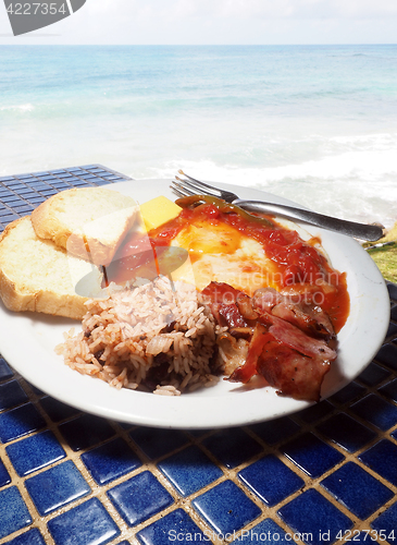 Image of huevos rancheros eggs with rice beans gallo pinto as seen in Cor