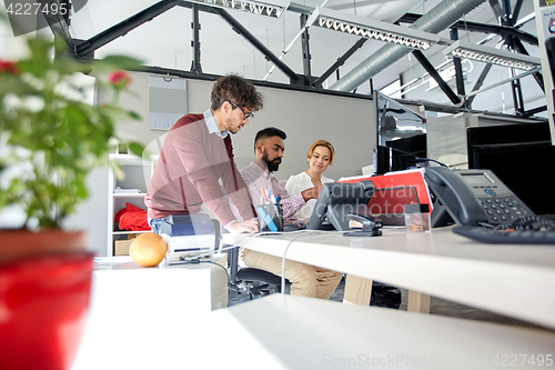 Image of business team working in office