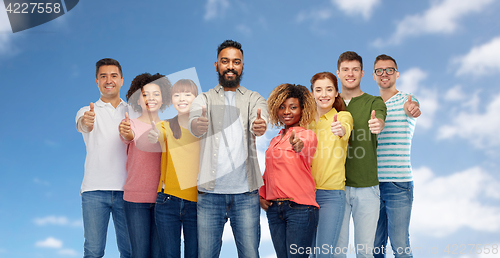 Image of international group of people showing thumbs up