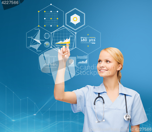 Image of doctor pointing finger to virtual chart over blue