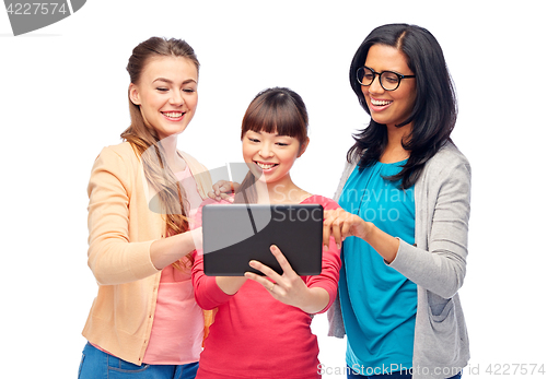 Image of international group of happy women with tablet pc