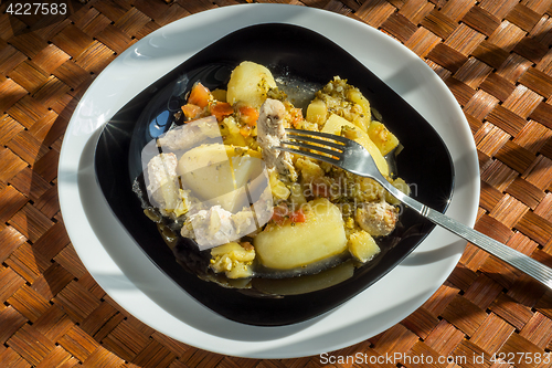 Image of Pork with potatoes and vegetables