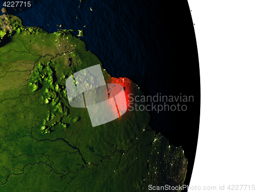 Image of Suriname from space during dusk