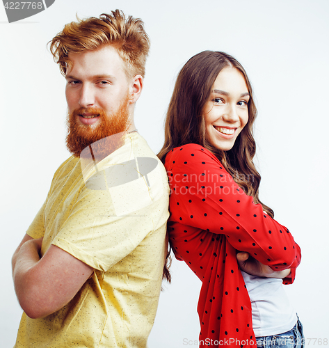 Image of young pretty teenage couple, hipster guy with his girlfriend happy smiling and hugging isolated on white background, lifestyle people concept 