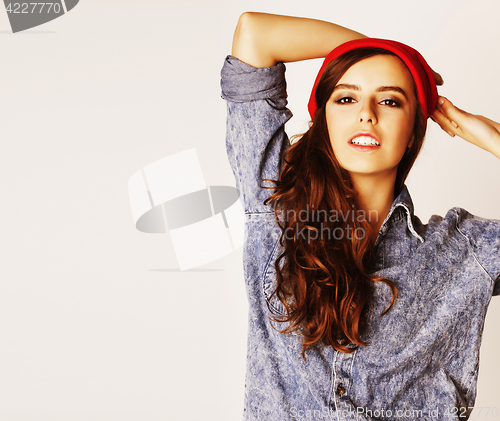 Image of young cheerful brunette teenage girl on white background