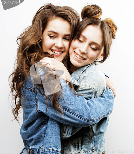 Image of best friends teenage girls together having fun, posing emotional on white background, besties happy smiling, lifestyle people concept close up