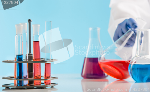 Image of Experiments in a chemistry lab. conducting an experiment in the laboratory.