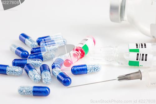 Image of Blue capsules and pills background