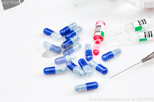 Image of Blue capsules and pills background