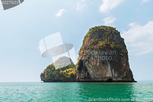 Image of krabi island cliff in ocean water at thailand