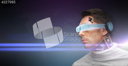 Image of man with futuristic glasses and sensors