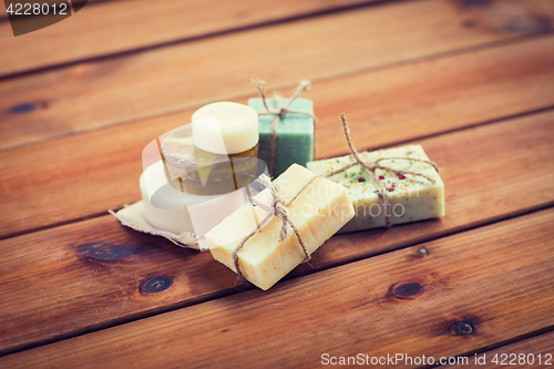 Image of close up of handmade soap bars on wood