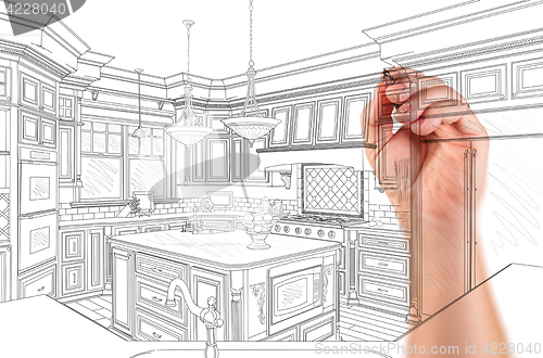 Image of Hand of Architect Drawing Detail of Custom Kitchen Design