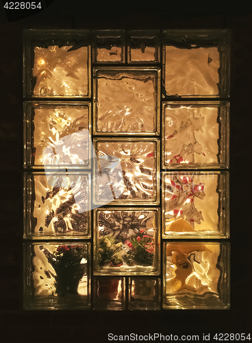 Image of Cozy light seen through the glass window