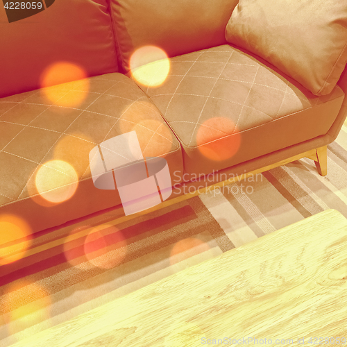 Image of Bokeh lights in the living room with orange sofa
