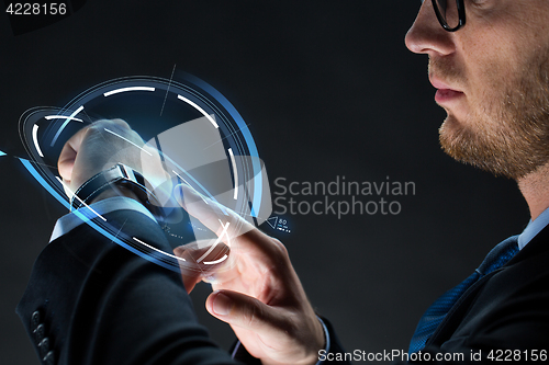 Image of close up of businessman with smartwatch