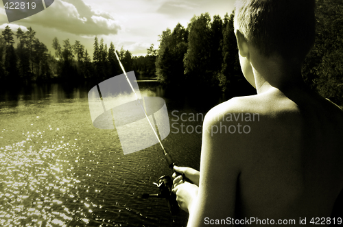 Image of  Boy Fishing a summer day