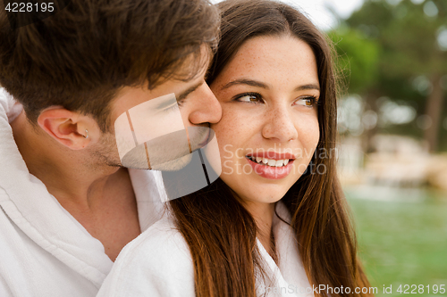 Image of Young couple enjoying vacations