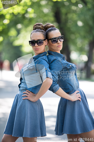 Image of twin sister with sunglasses