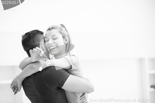 Image of happy Young couple moving in new house