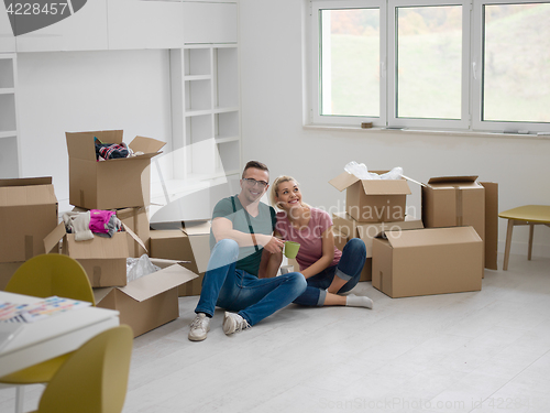 Image of young couple in new house
