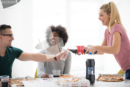 Image of multiethnic group of young people have a lunch break