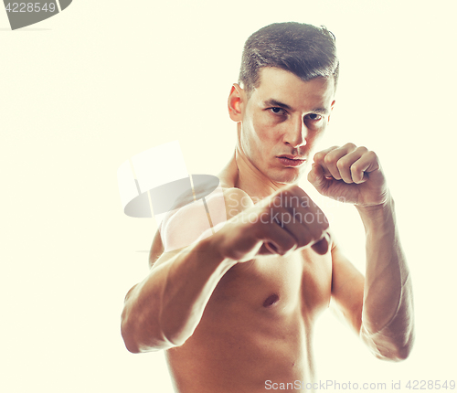 Image of young handsome naked torso man boxing on white background isolated, lifestyle sport agressive people concept