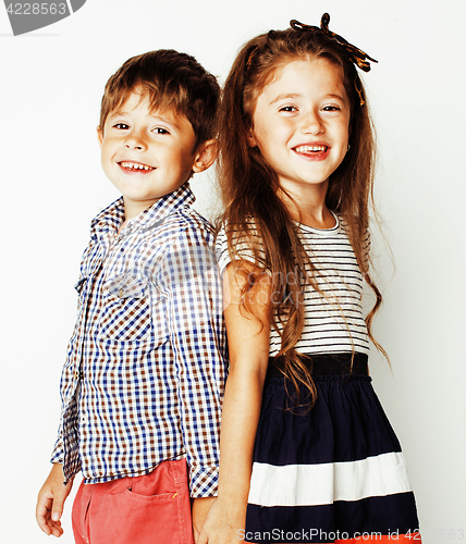 Image of little cute boy and girl hugging playing on white background, ha