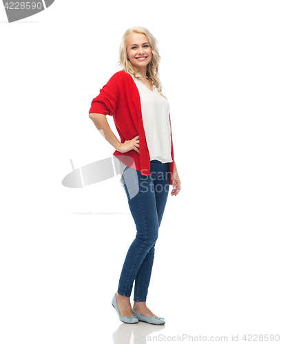 Image of happy smiling young woman in red cardigan