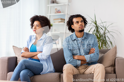 Image of unhappy couple having argument at home