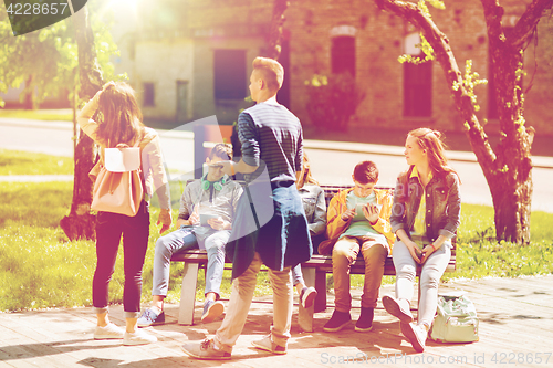 Image of group of teenage students at school yard