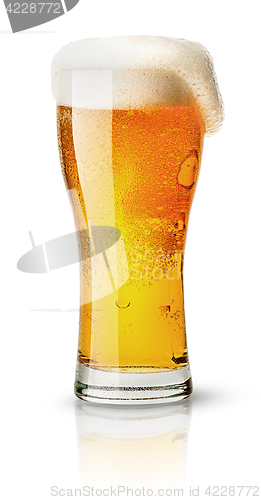 Image of Light beer in sweaty glass and foam