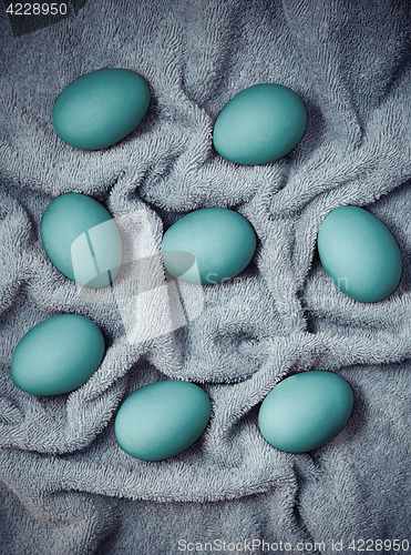 Image of Easter eggs drying on a soft fabric