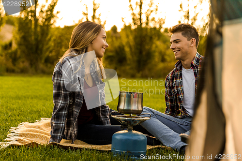 Image of Young couple camping