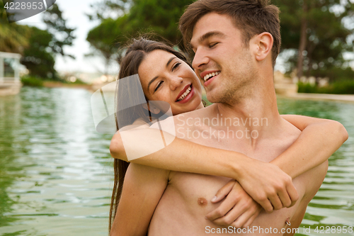 Image of Young couple having fun