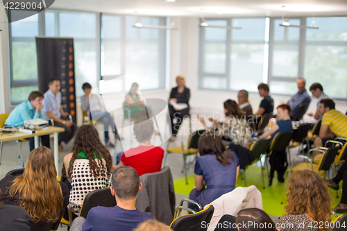 Image of Round table discussion at business and entrepreneurship convention.