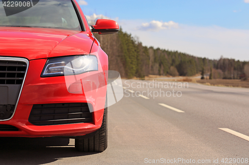 Image of Red Car by Road