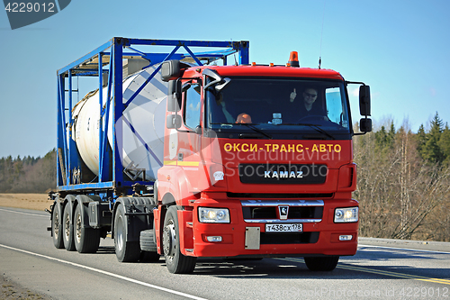 Image of Red Kamaz Truck T1840 Tank Container Transport on Sunny Day