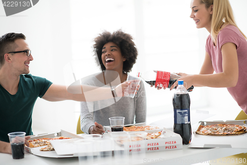 Image of multiethnic group of young people have a lunch break