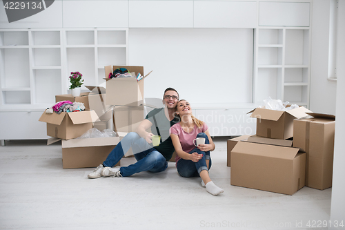 Image of young couple in new house