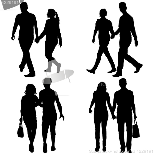 Image of Set Silhouette man and woman walking hand in hand