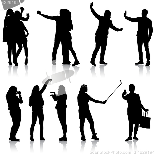 Image of Set silhouettes man and woman taking selfie with smartphone on white background. illustration