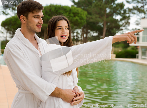 Image of Young couple enjoying vacations