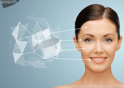 Image of woman face with low poly projection and pointers