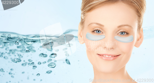 Image of close up of woman face with under-eye patches