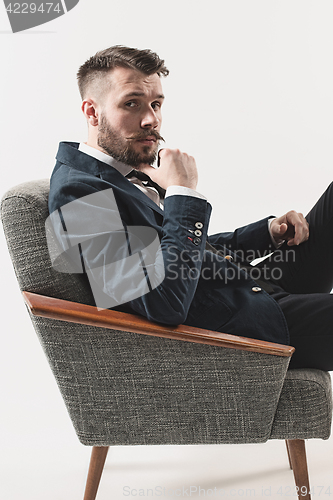 Image of Portrait of stylish handsome young man